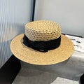 BOATER HAT IN BEIGE RAFFIA WITH BLACK FABRIC