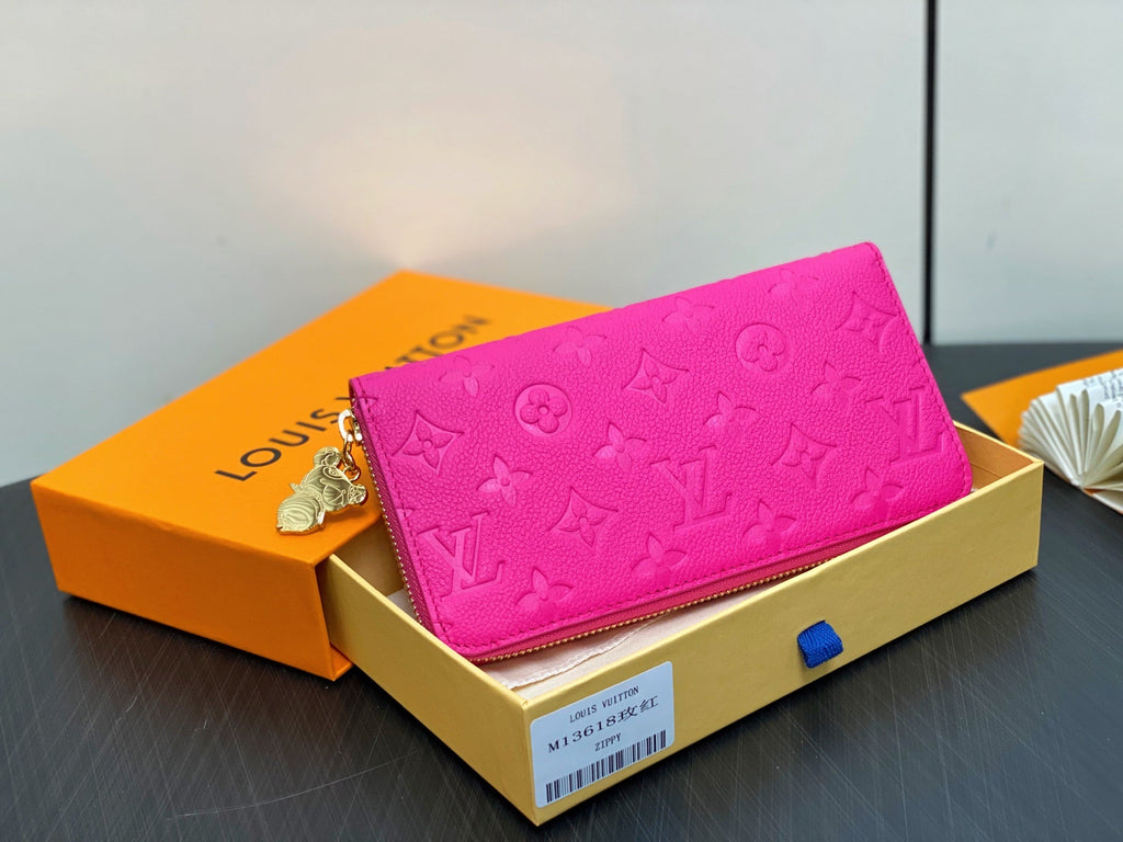 LV × TM Zipper Wallet Pink Gold Leather 329895