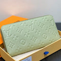 LV × TM Zipper Wallet Green Gold Leather 329877