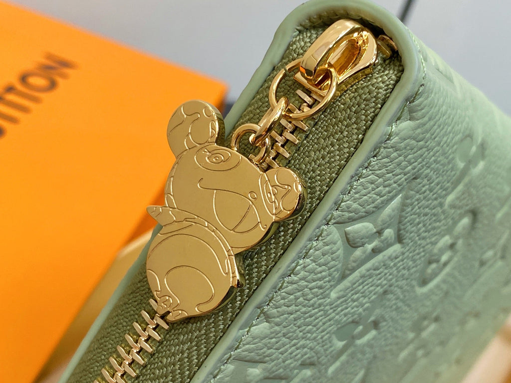 LV × TM Zipper Wallet Green Gold Leather 329877