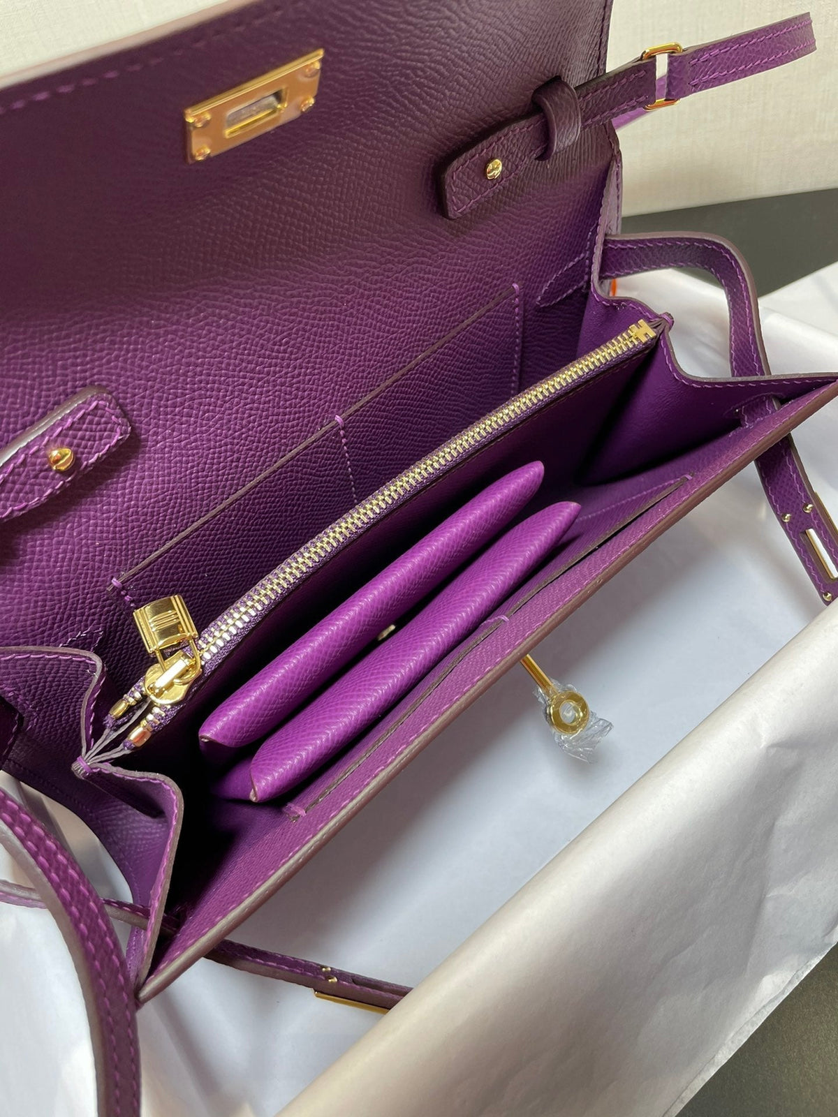 kelly to go wallet 20.5 purple epsom gold hardware