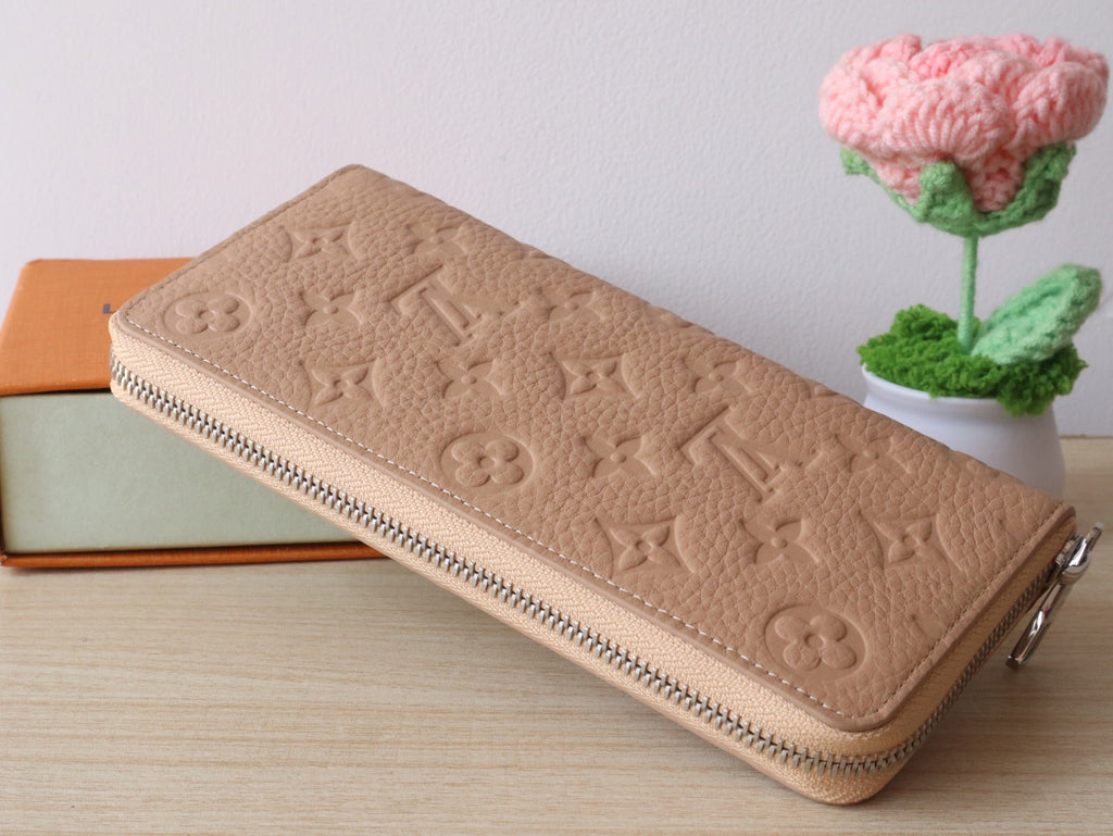 LV Zippy Wallet Vertical Monogram Grained Taurillon Cowhide