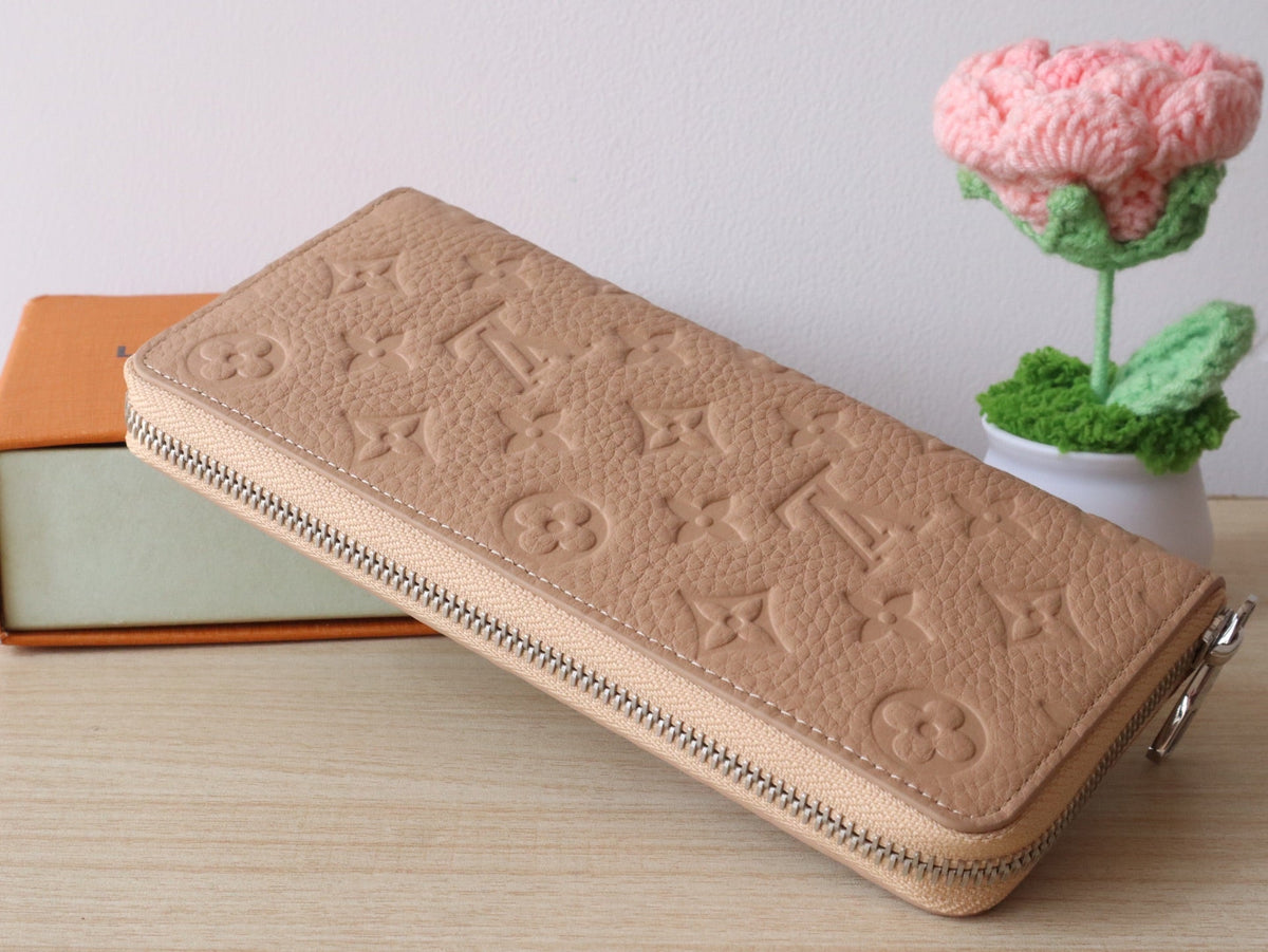 LV Zippy Wallet Vertical Monogram Grained Taurillon Cowhide
