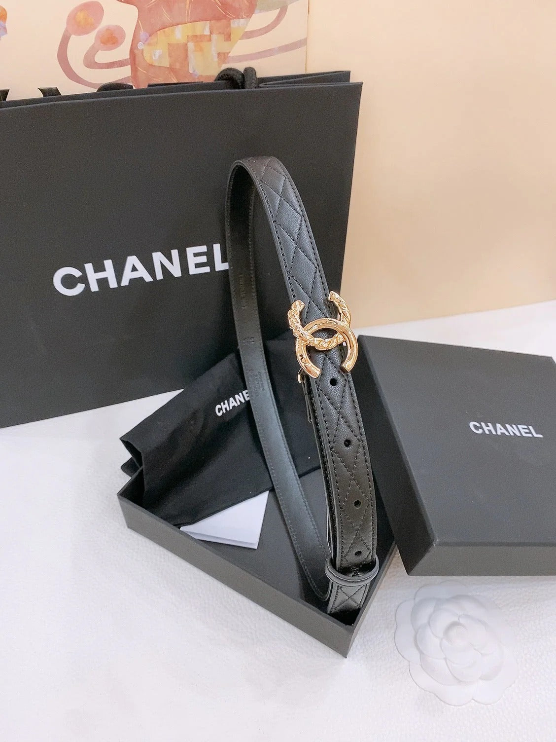 DOUBLE C BELT 20MM IN BLACK CALFSKIN WITH QUILTED STITCHING AND SPIRAL SILVER BUCKLE