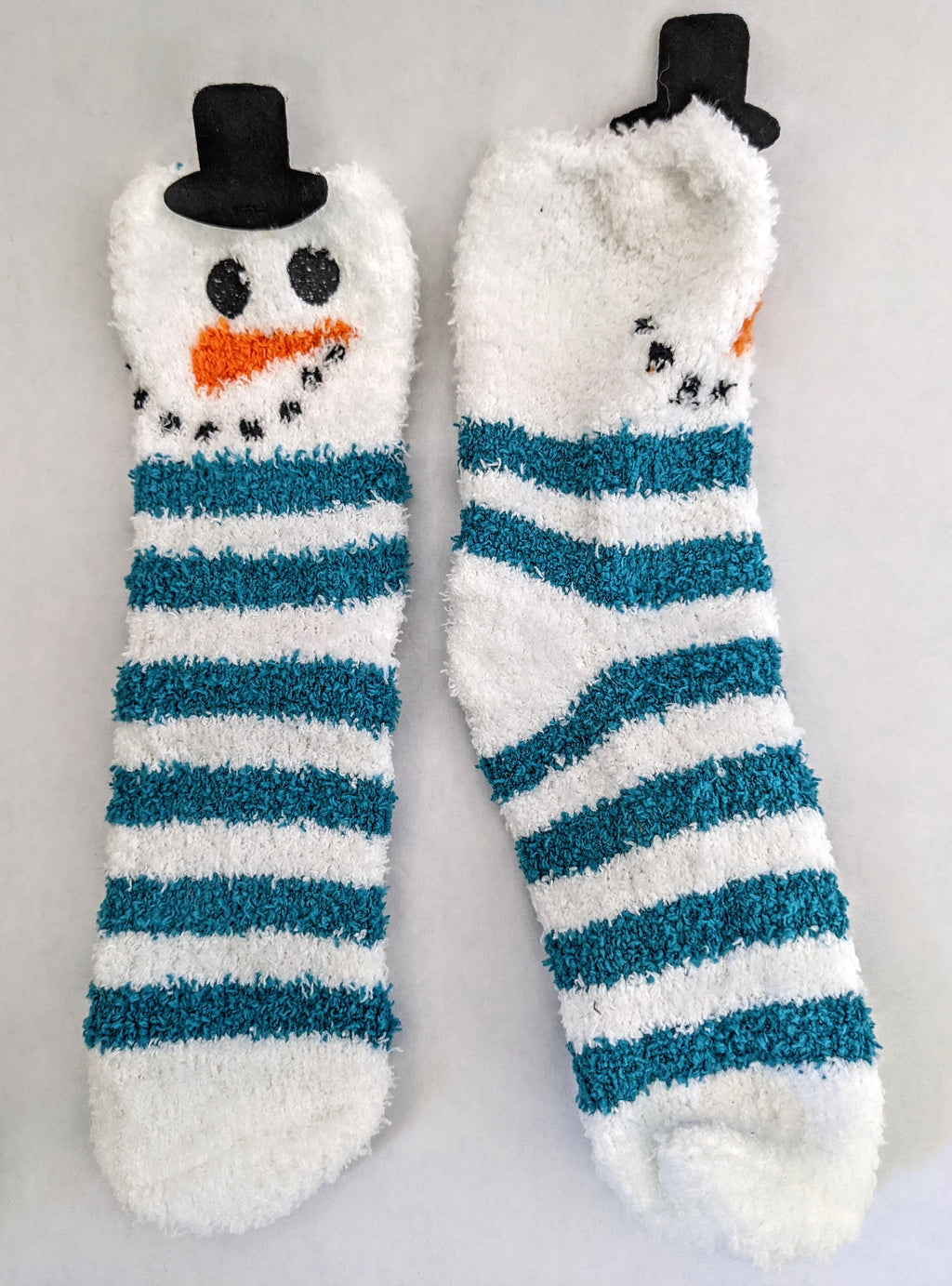 Holiday Fluffy Cozy Fuzzy Socks are back!!!  Santa, Snowman or Reindeer choices