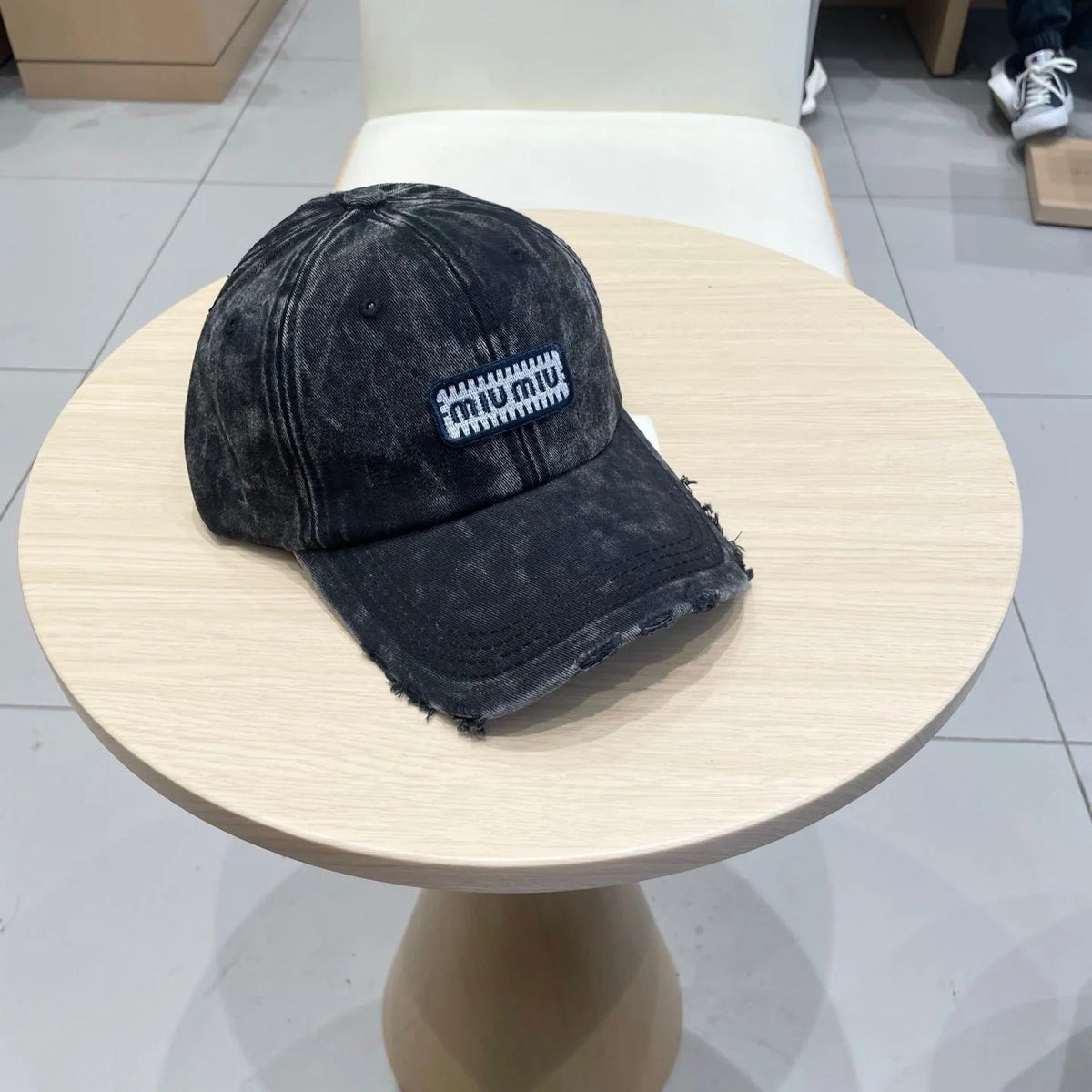 MM DISTRESSED FABRIC BASEBALL CAP IN BLACK WITH EMBROIDERED LOGO