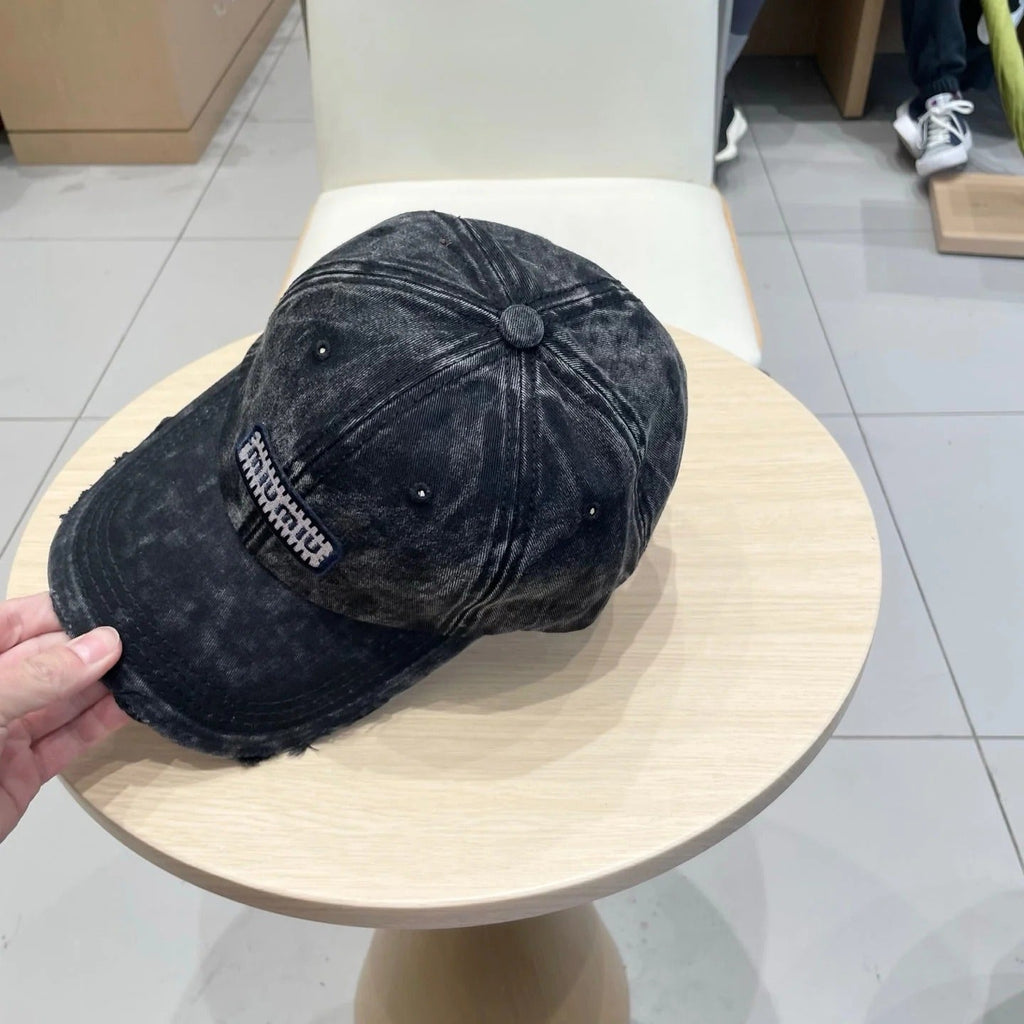 MM DISTRESSED FABRIC BASEBALL CAP IN BLACK WITH EMBROIDERED LOGO